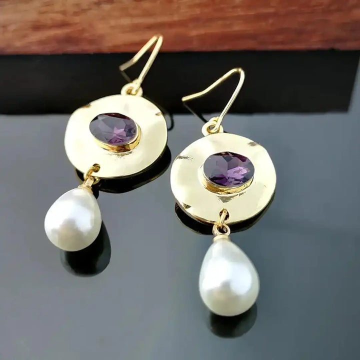 Parel Oorbellen met Paarse Zirconia